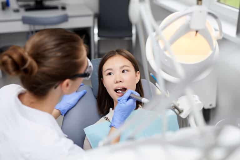 Verber Dental East Dentist cleaning a dental patient at their Harrisburg, PA dental office