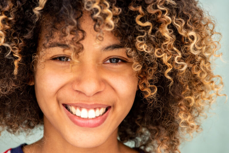 Close-up of a woman smiling woman after getting VerTrue Teeth Whitening